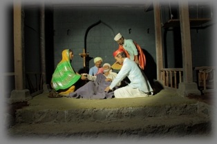 A devotee with Shri Sai in the Chawadi